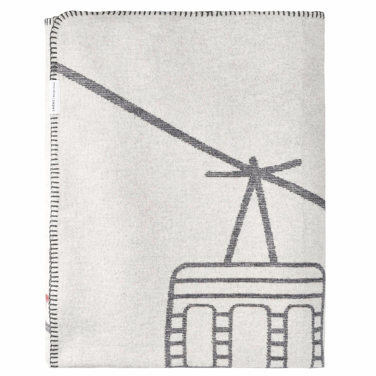 Decke, helles Leinenmuster mit dunklem Linienmotiv und sichtbarer Ziernaht am Rand