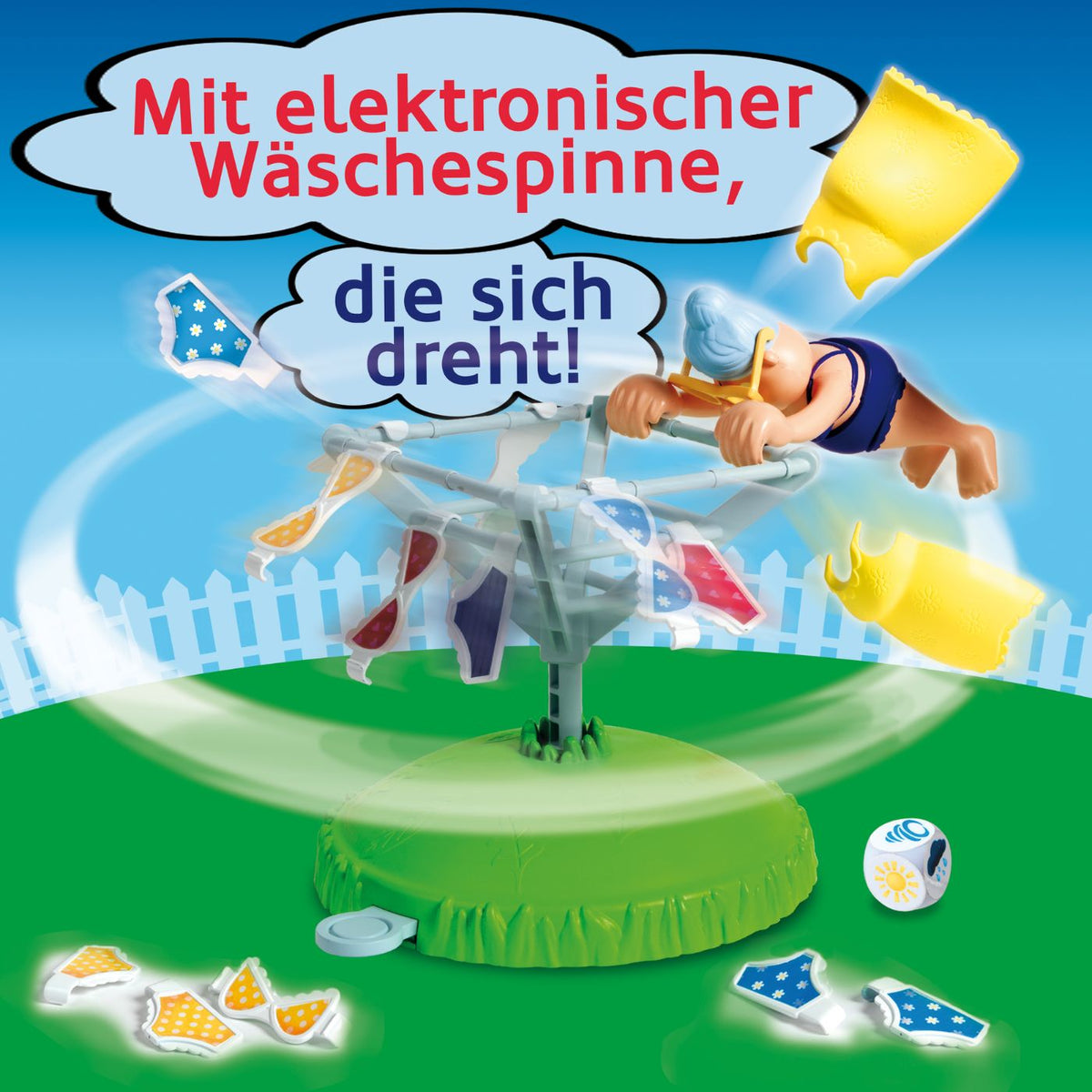 Spielzeug-Wäschespinne mit grüner Basis, transparentem Gestell und gelben Wäschestücken