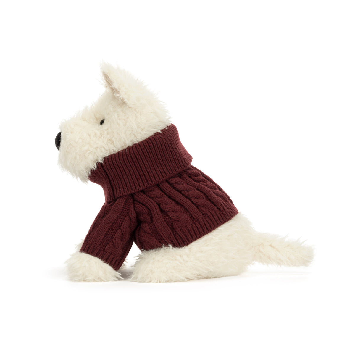 Kuscheltier-Hund mit cremefarbenem Fell und dunkelrotem Pullover, Ansicht von der Seite