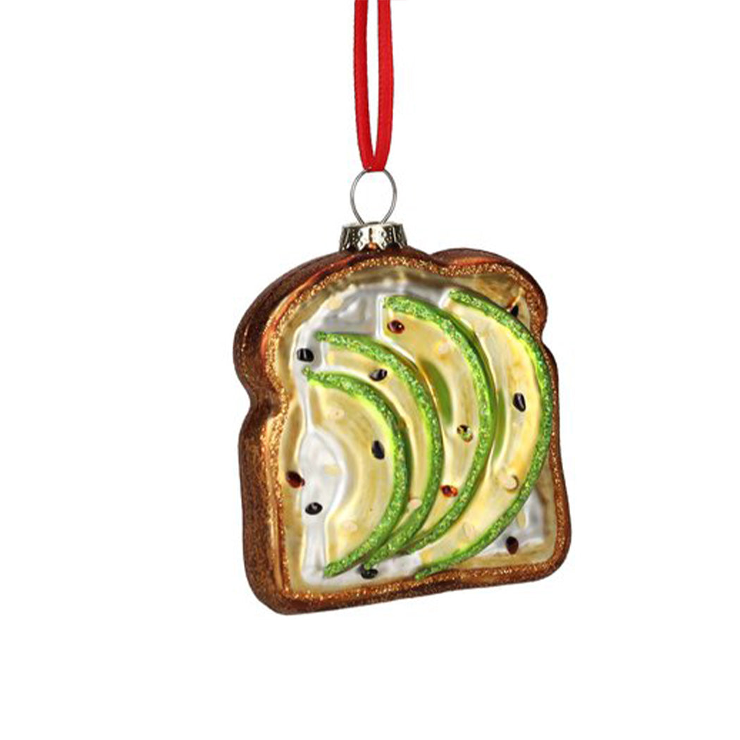 Toastförmiger Anhänger mit Avocado-Scheiben, braunem Rand und roter Schlaufe