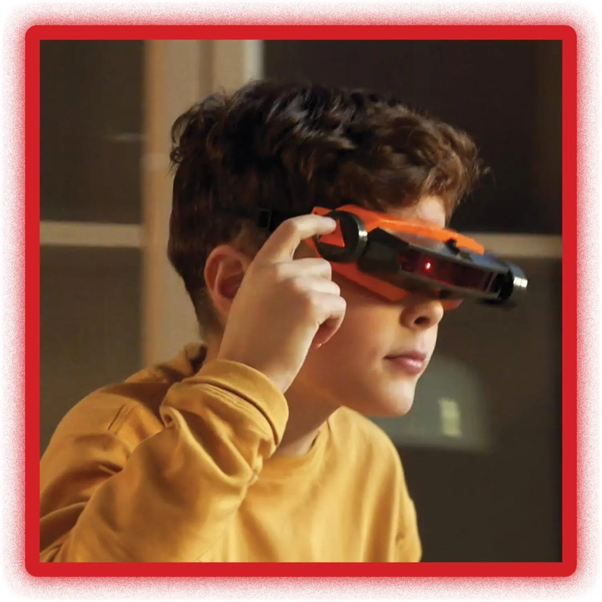 Laser-Visier für Kinder mit orangefarbenem Gehäuse und rotem Licht