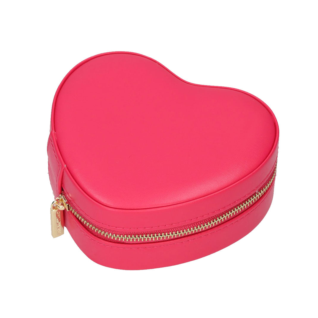 Herzförmiges Schmucketui in Fuchsia, geschlossen mit Reißverschluss und goldfarbenem Zuganhänger links.